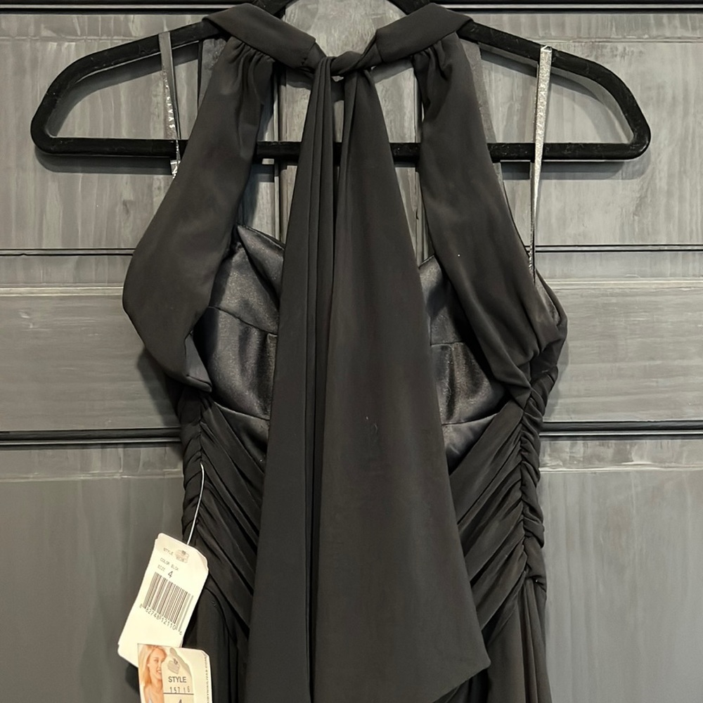 Brand new Black elegant long dress - sweetheart top with low back and bow detail